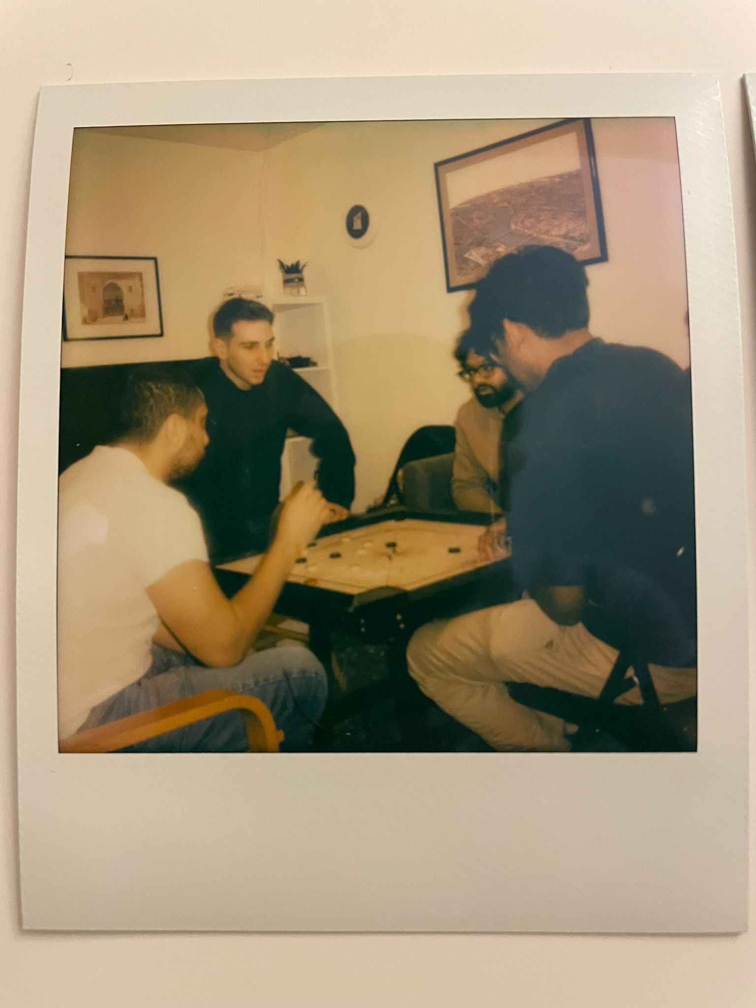Sharan Sahu playing carrom with friends